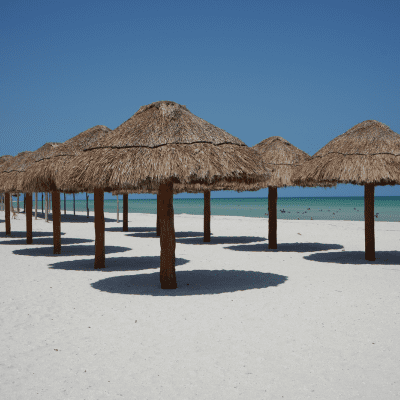 Image of palapas on beach in sisal