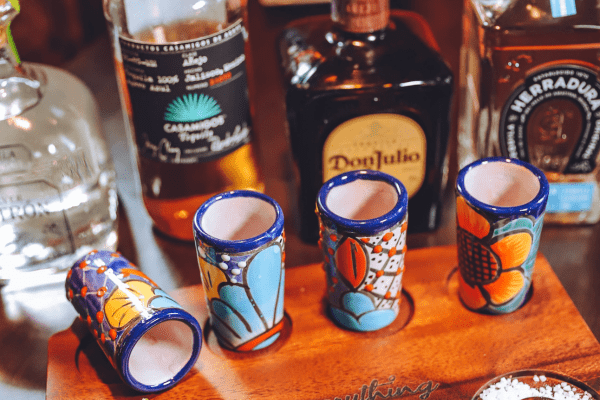 image of tequila shot glasses and four tequilas