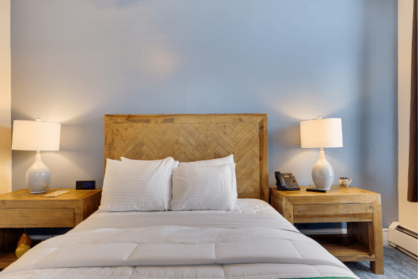 Deluxe guest room interior with seating area at La Posada Milford hotel