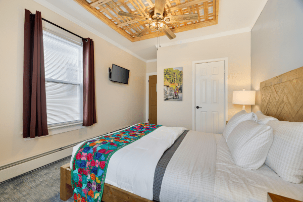 Deluxe guest room interior with workspace at La Posada Milford hotel