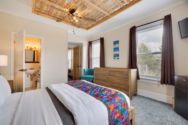 Cozy bedroom interior in Sacred Cenote Premium Queen Room at La Posada Milford hotel