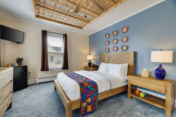 Modern seating area in Sacred Cenote Premium Queen Room at La Posada Milford hotel