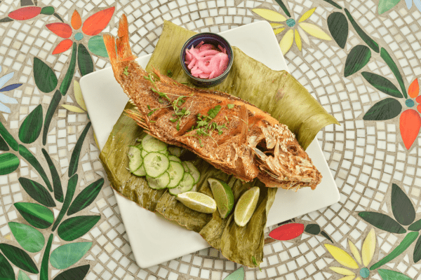 Outdoor patio seating area at La Posada Milford hotel