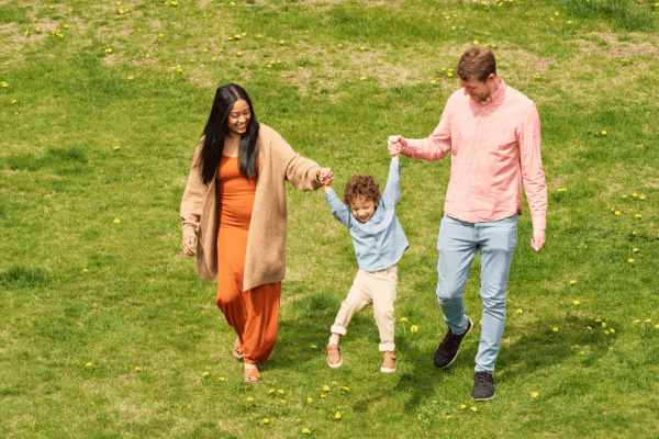 Family enjoying outdoor playtime with kids at La Posada Milford